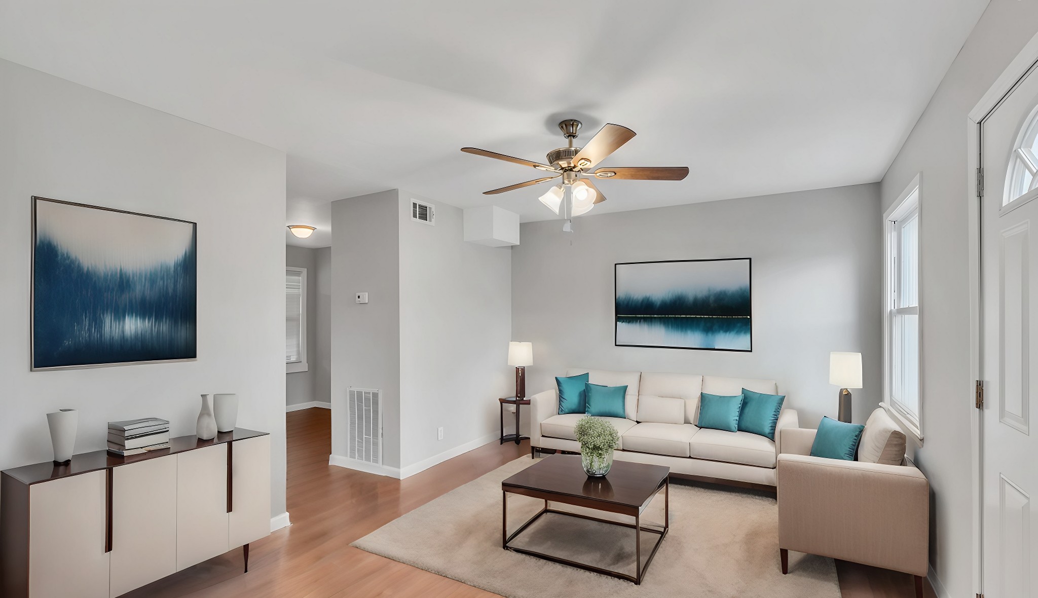 a living room with furniture and a flat screen tv