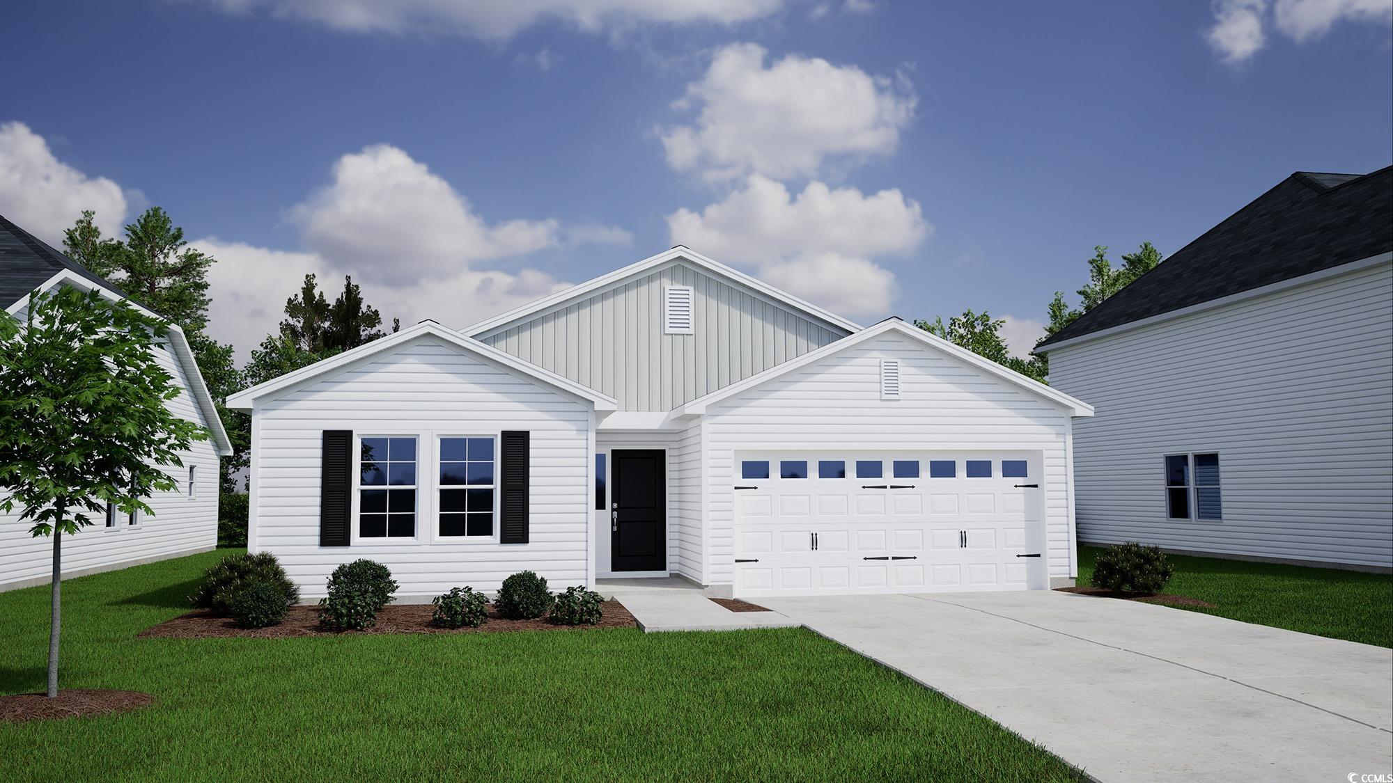 View of front facade featuring a front lawn and a