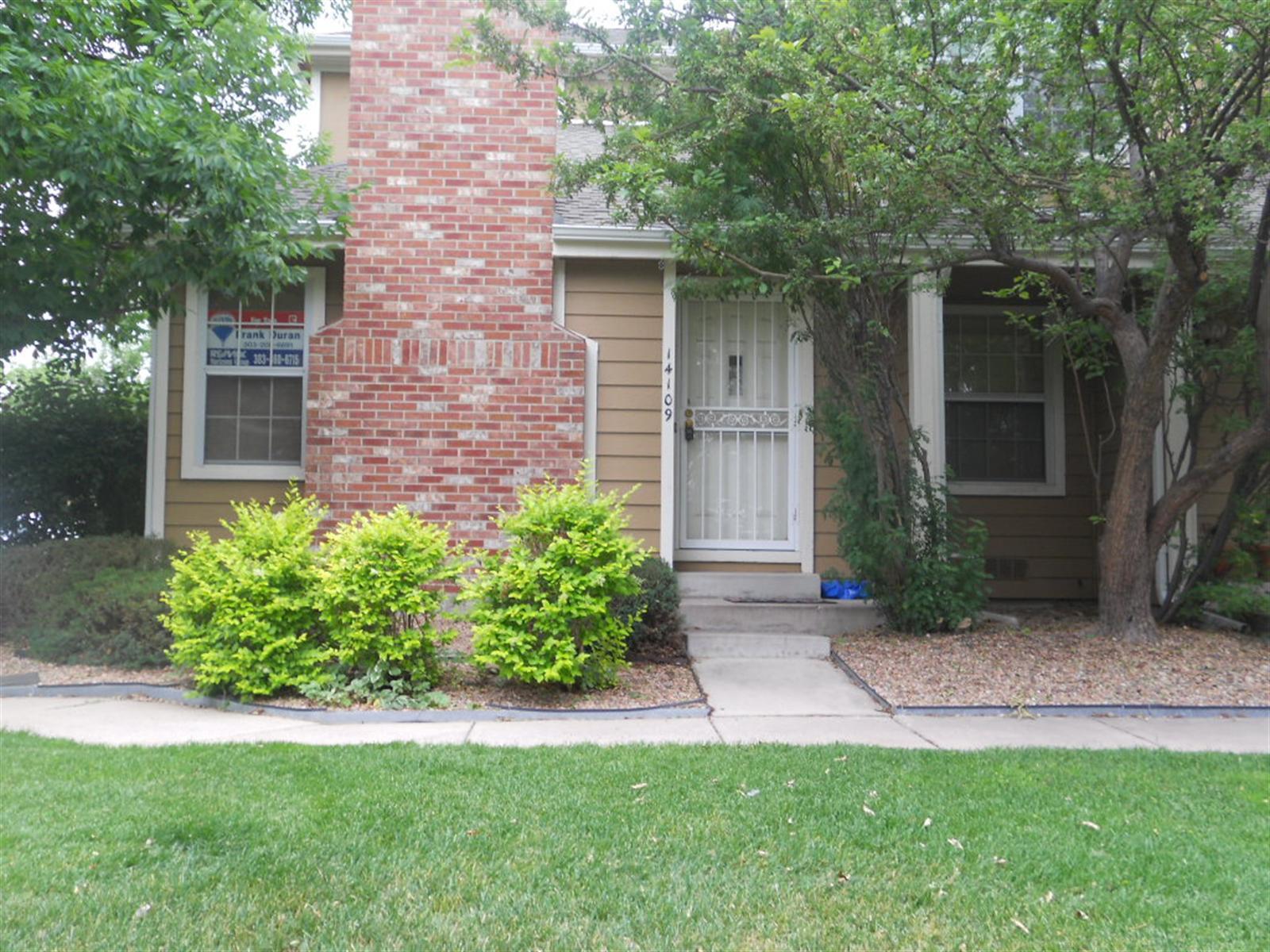 a view of a back yard of the house