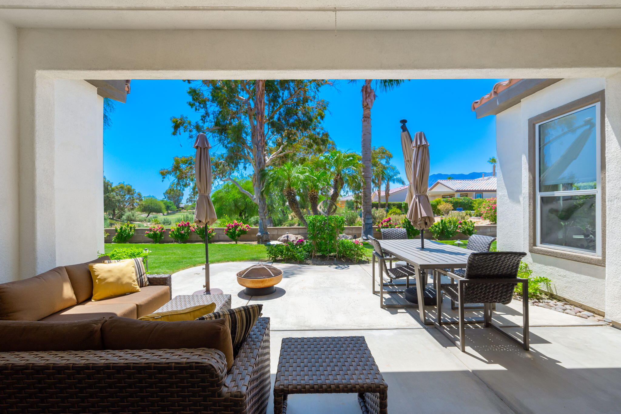 a outdoor living space with furniture and a garden