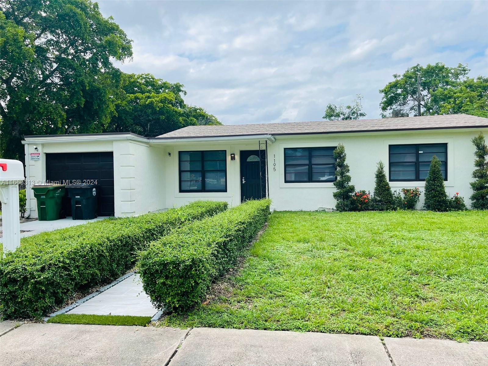 front view of house with a yard