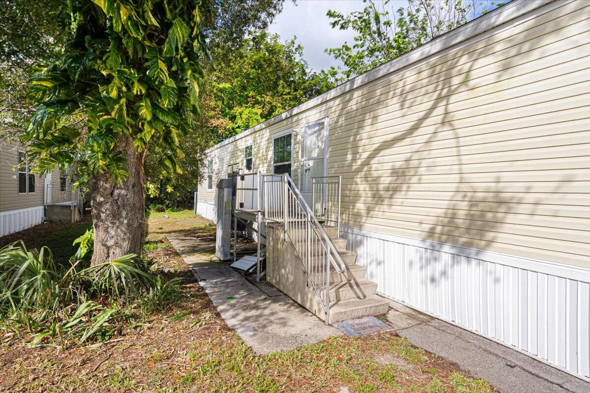 a view of a back yard of the house