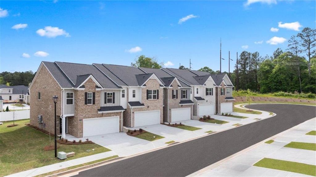 a front view of a house with entertaining space