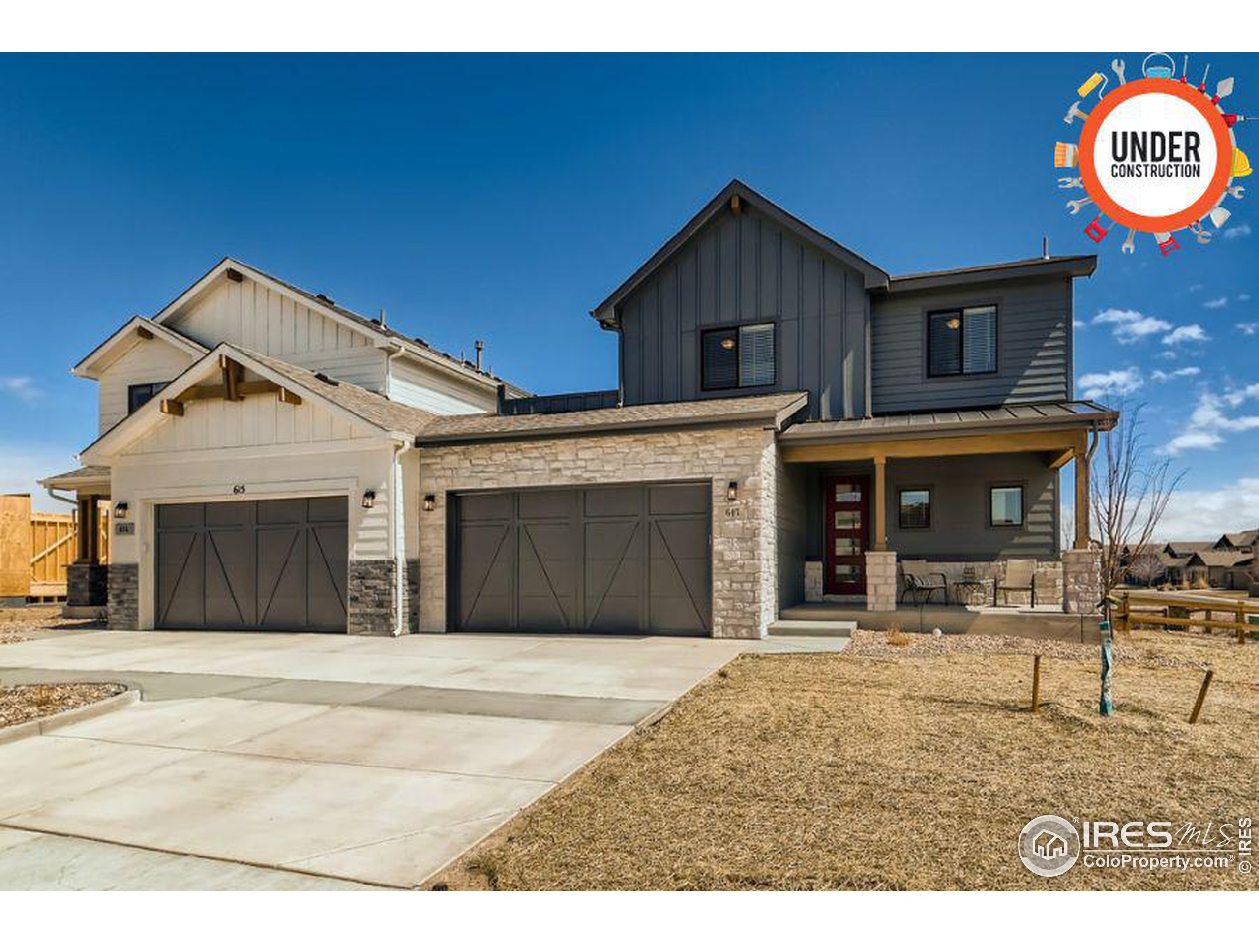 a front view of a house with a garage