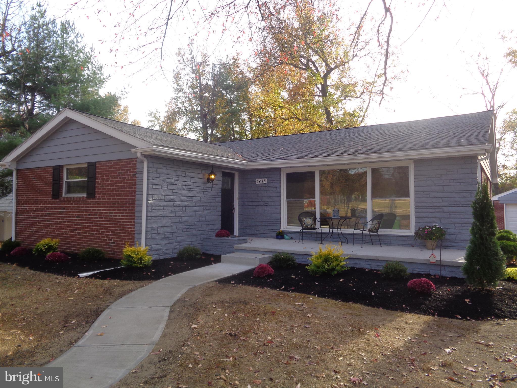 front view of a house with a patio