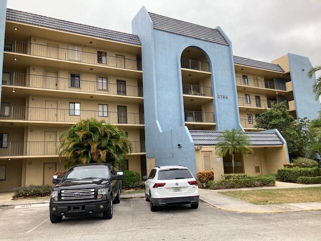 a car parked in front of a building