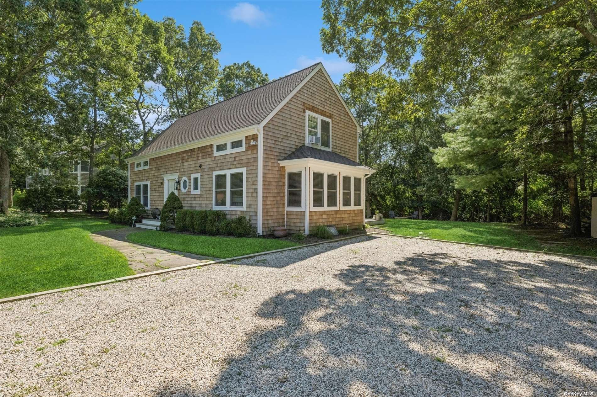 a house with yard in front of it