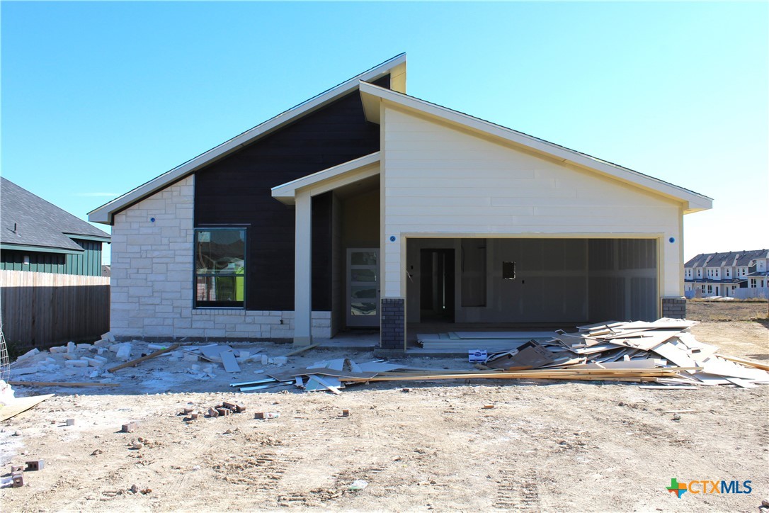 a view of a house with a patio