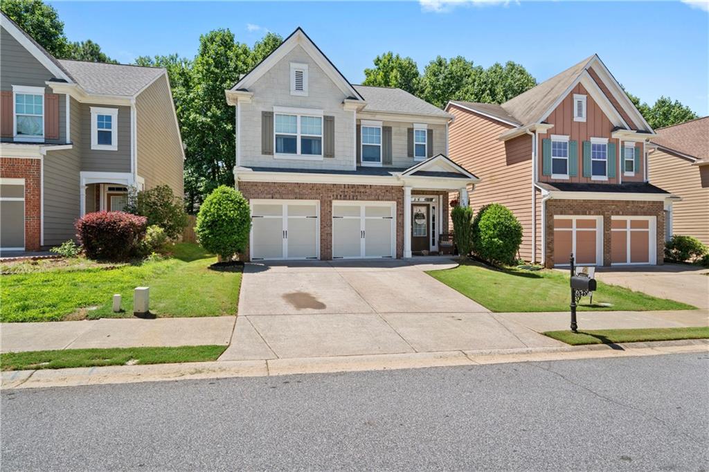 front view of a house with a yard