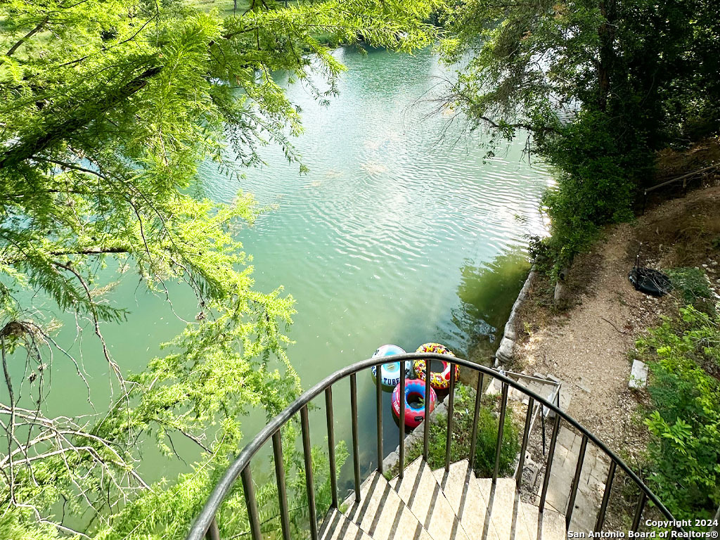 a balcony with view of lake