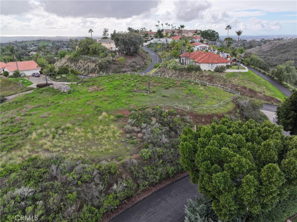 an aerial view of residential house with outdoor space