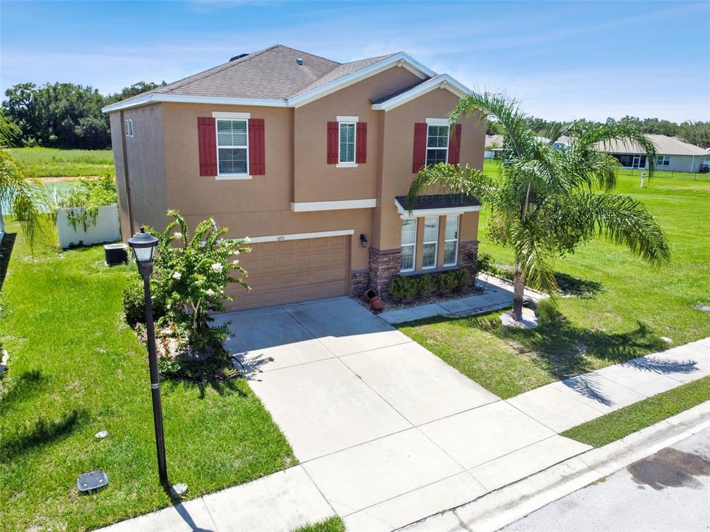 a front view of house with yard