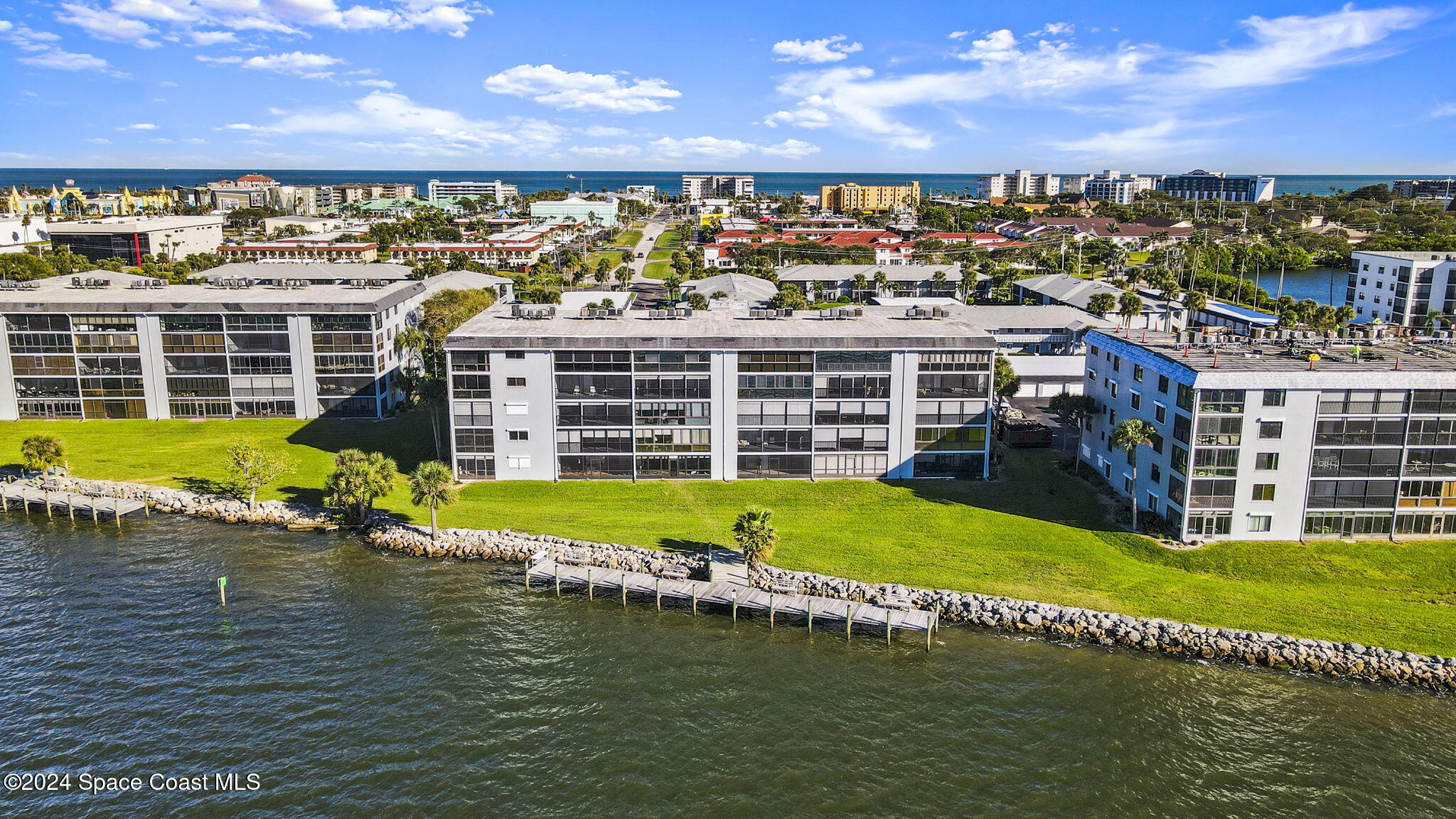 a view of a lake with a building in the background