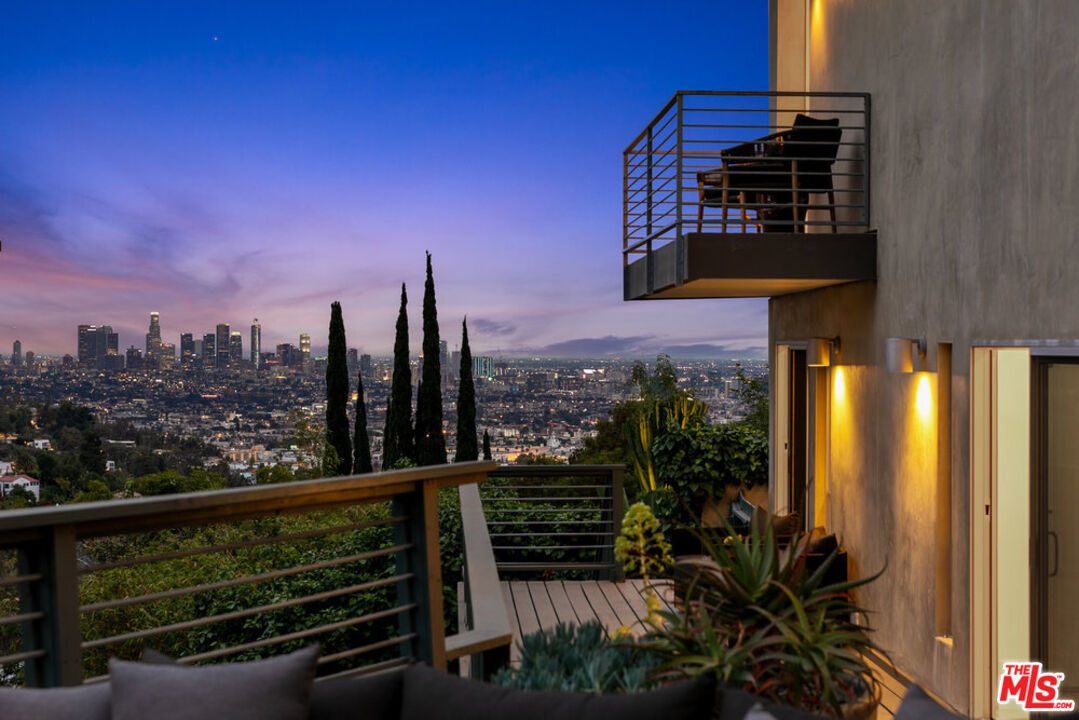 a view of a balcony with an outdoor space