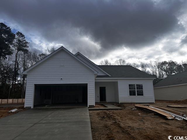 View of front of home featuring a garage