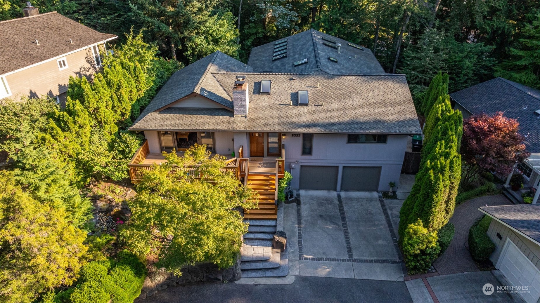 an aerial view of a house with garden