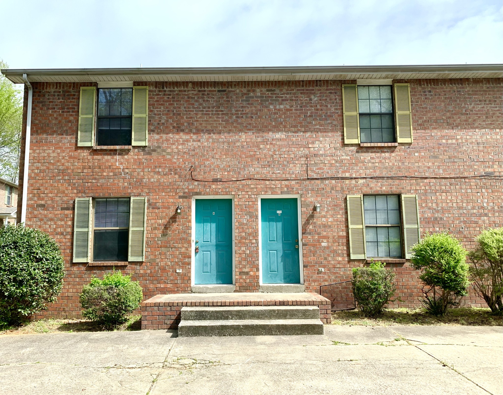 a front view of a house having yard