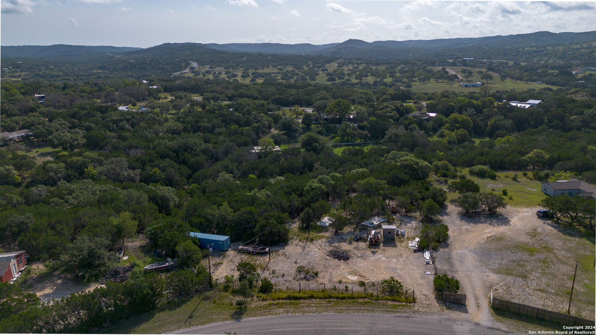 an aerial view of residential house with outdoor space