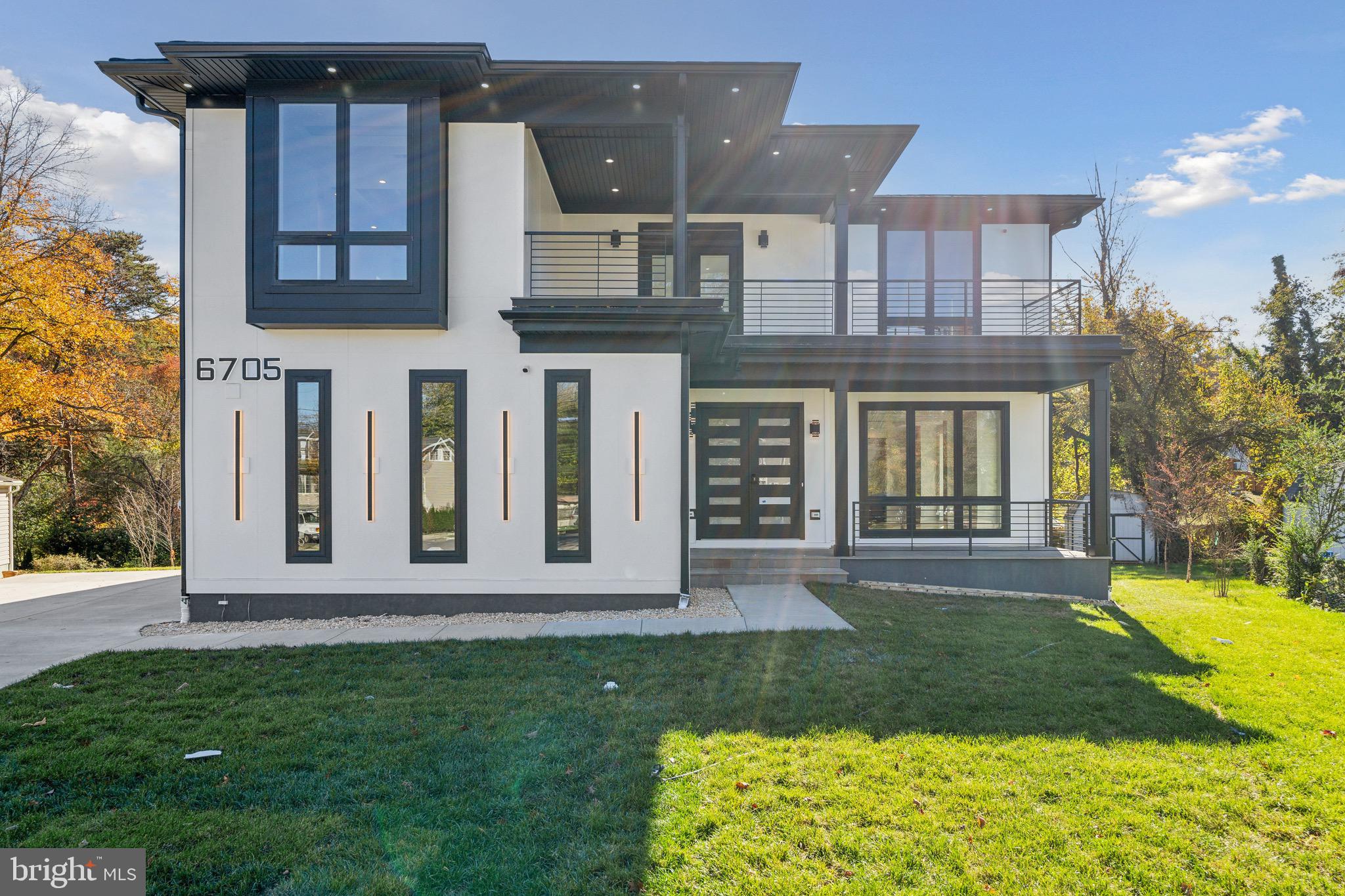 front view of a house with a yard