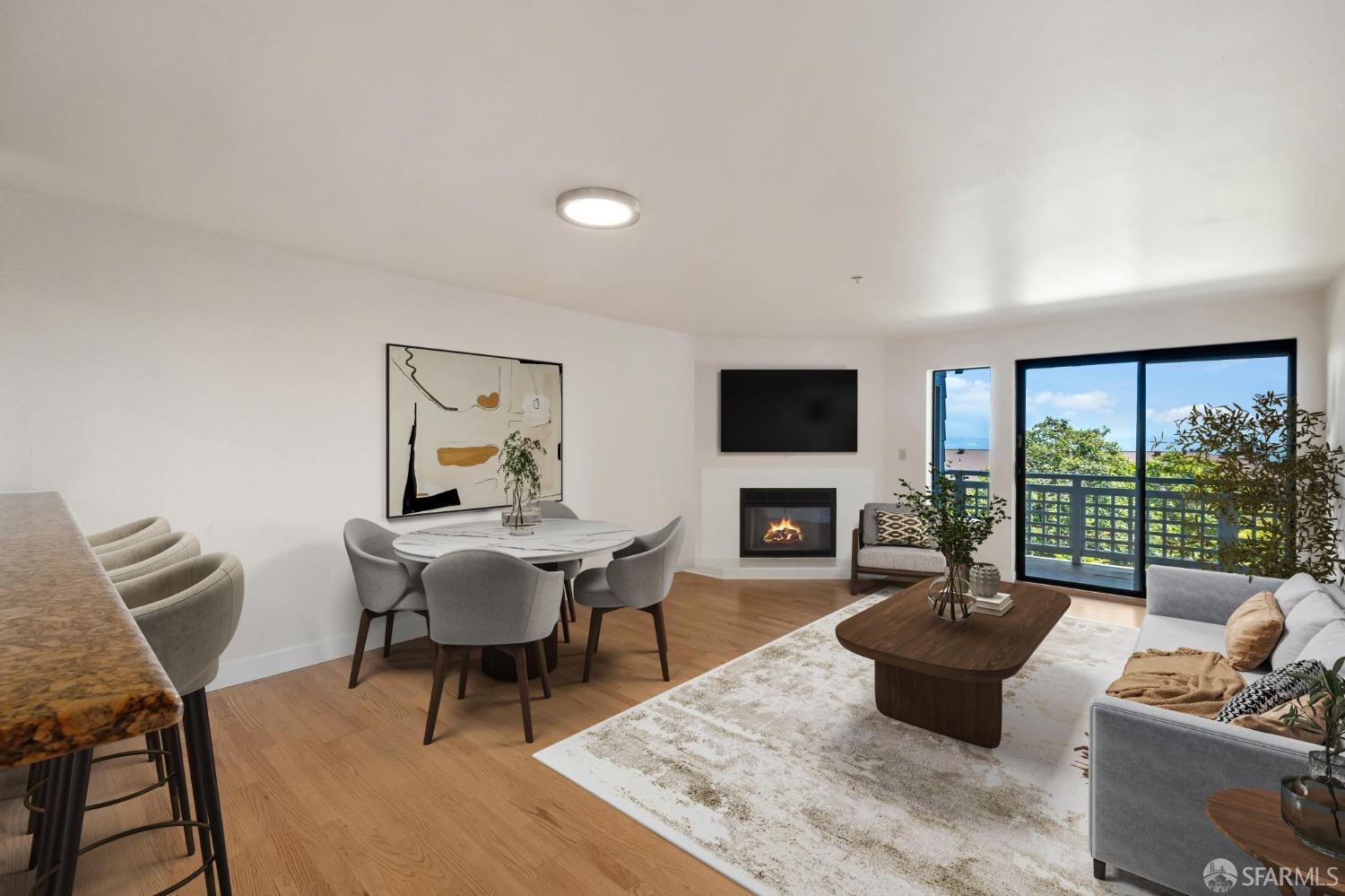 a living room with furniture a flat screen tv and a large window