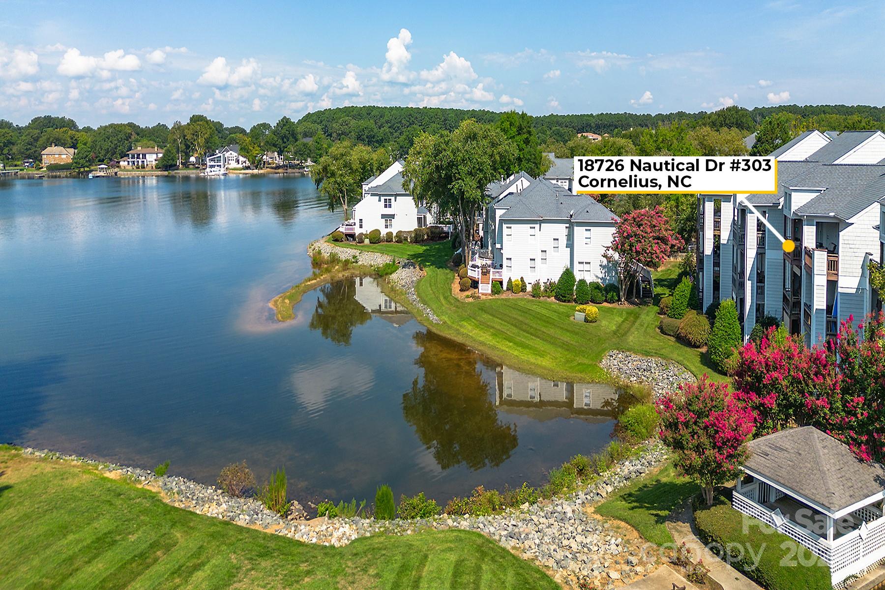 a view of a lake with a building in the background