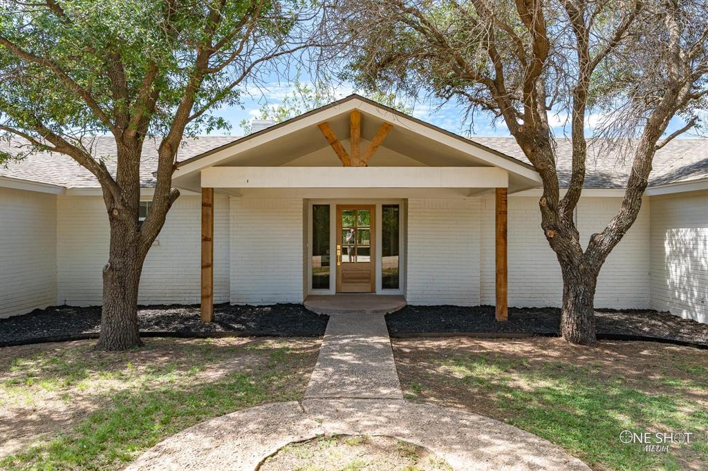 a front view of house with yard