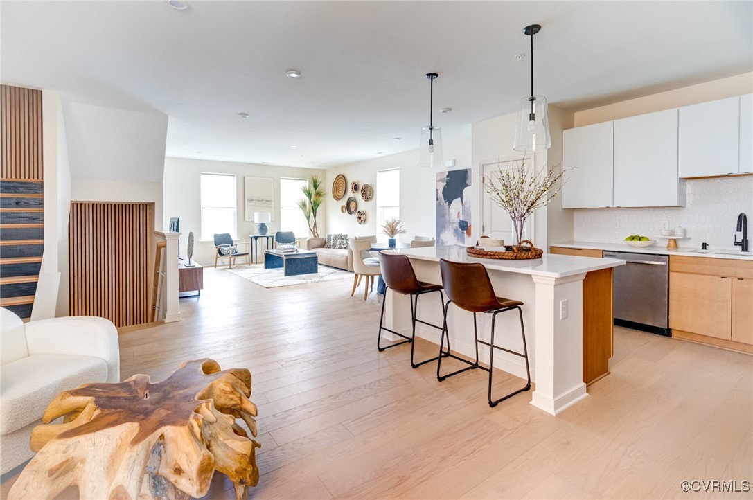 a view of a kitchen and dining room