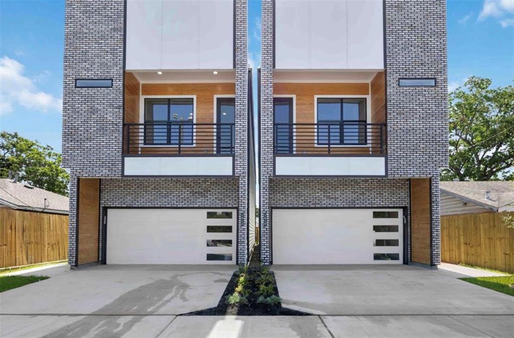 a front view of a house with a garage