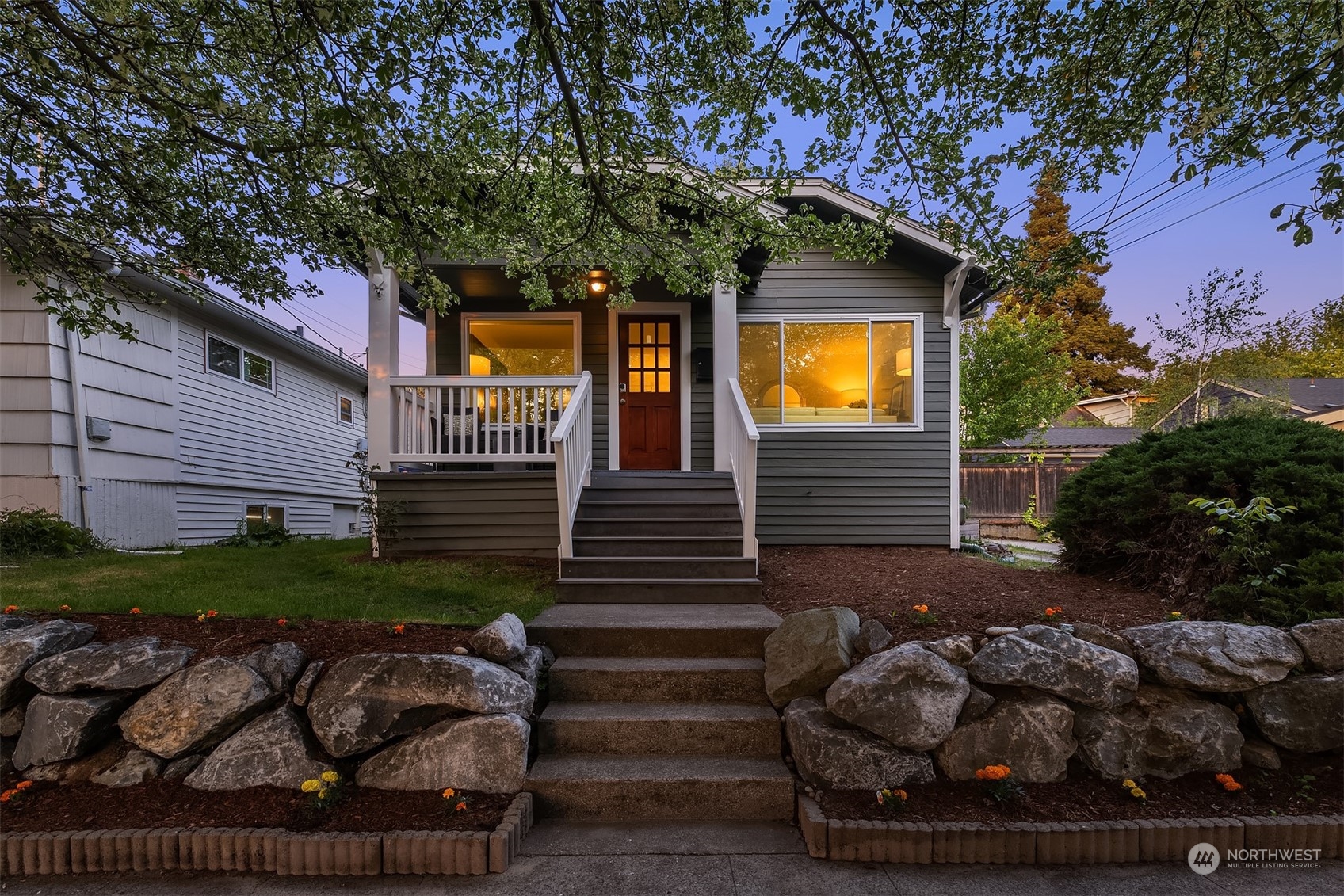 a view of a house with a back yard