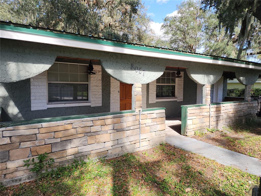 a view of house with outdoor space