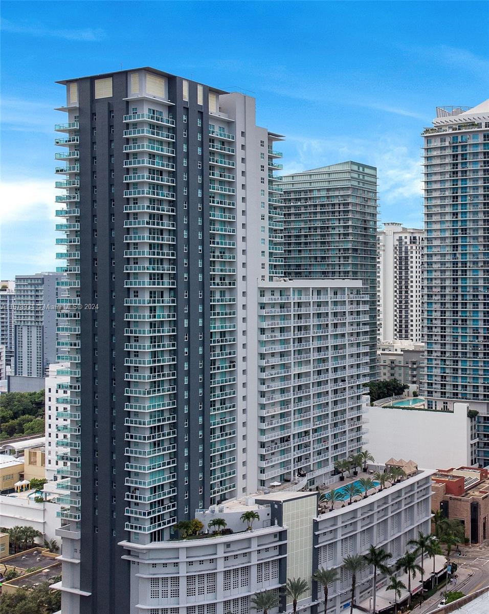 a view of a city with tall buildings