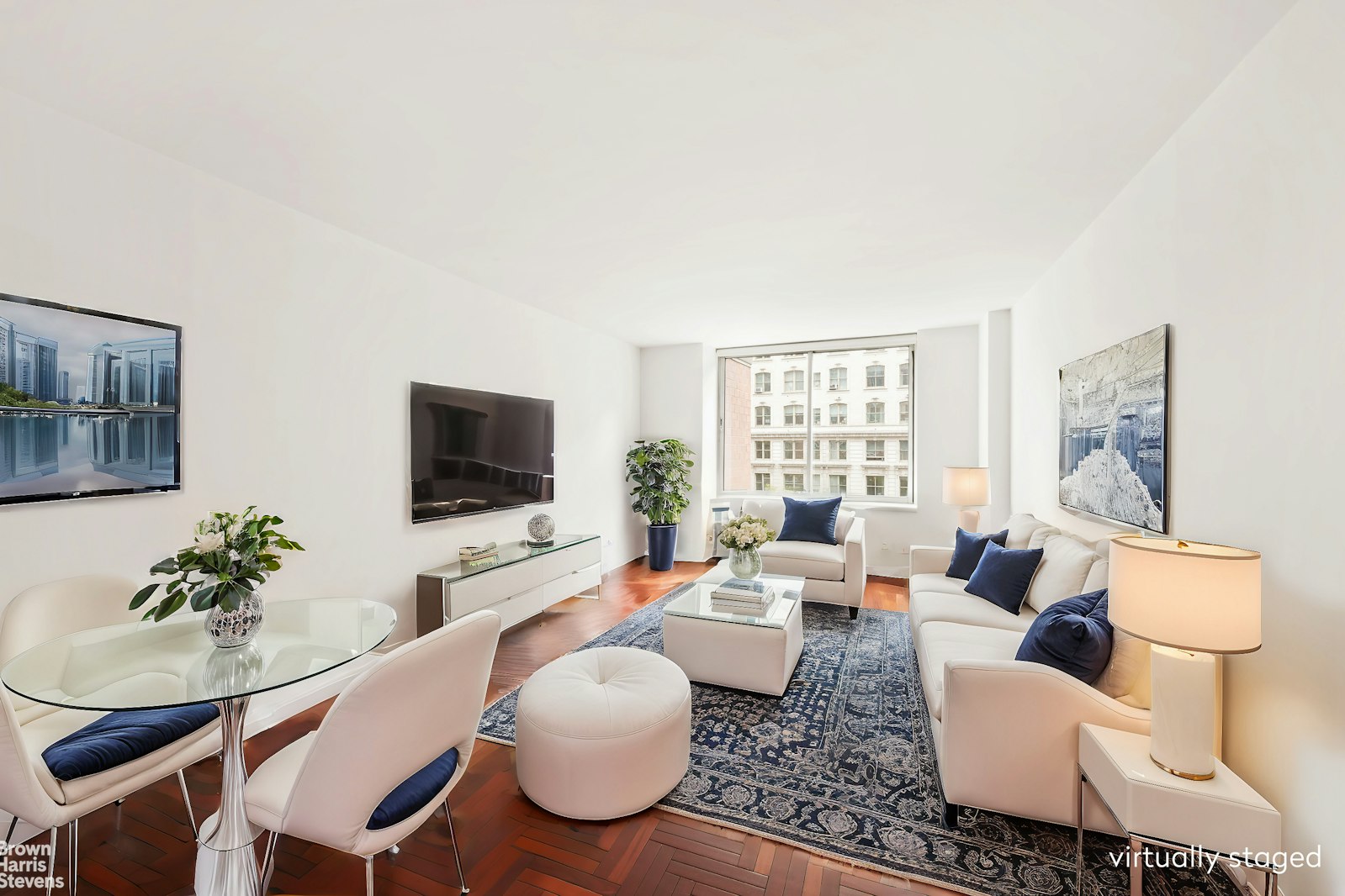 a living room with furniture or couch and a flat screen tv