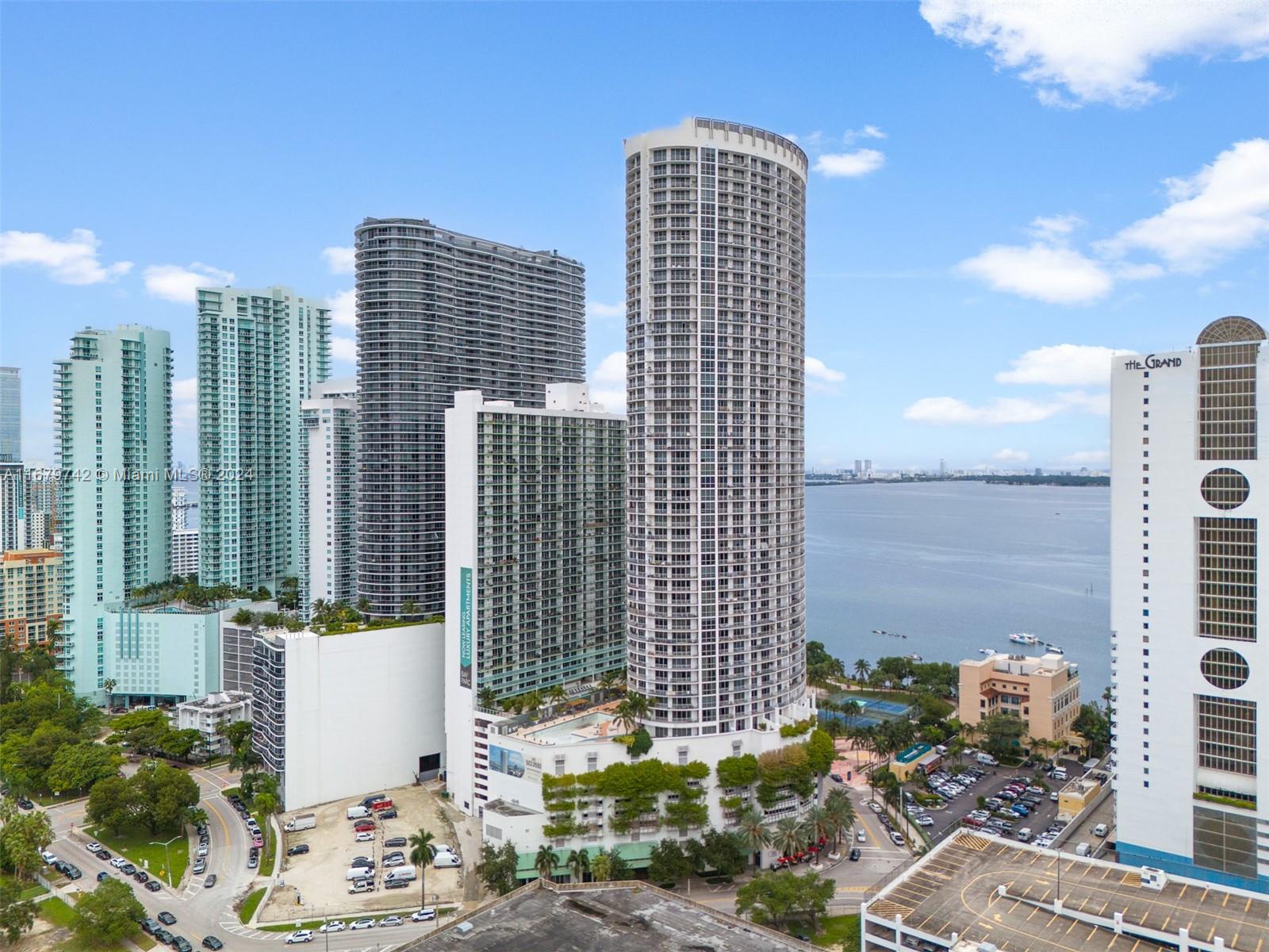 a view of city with tall buildings