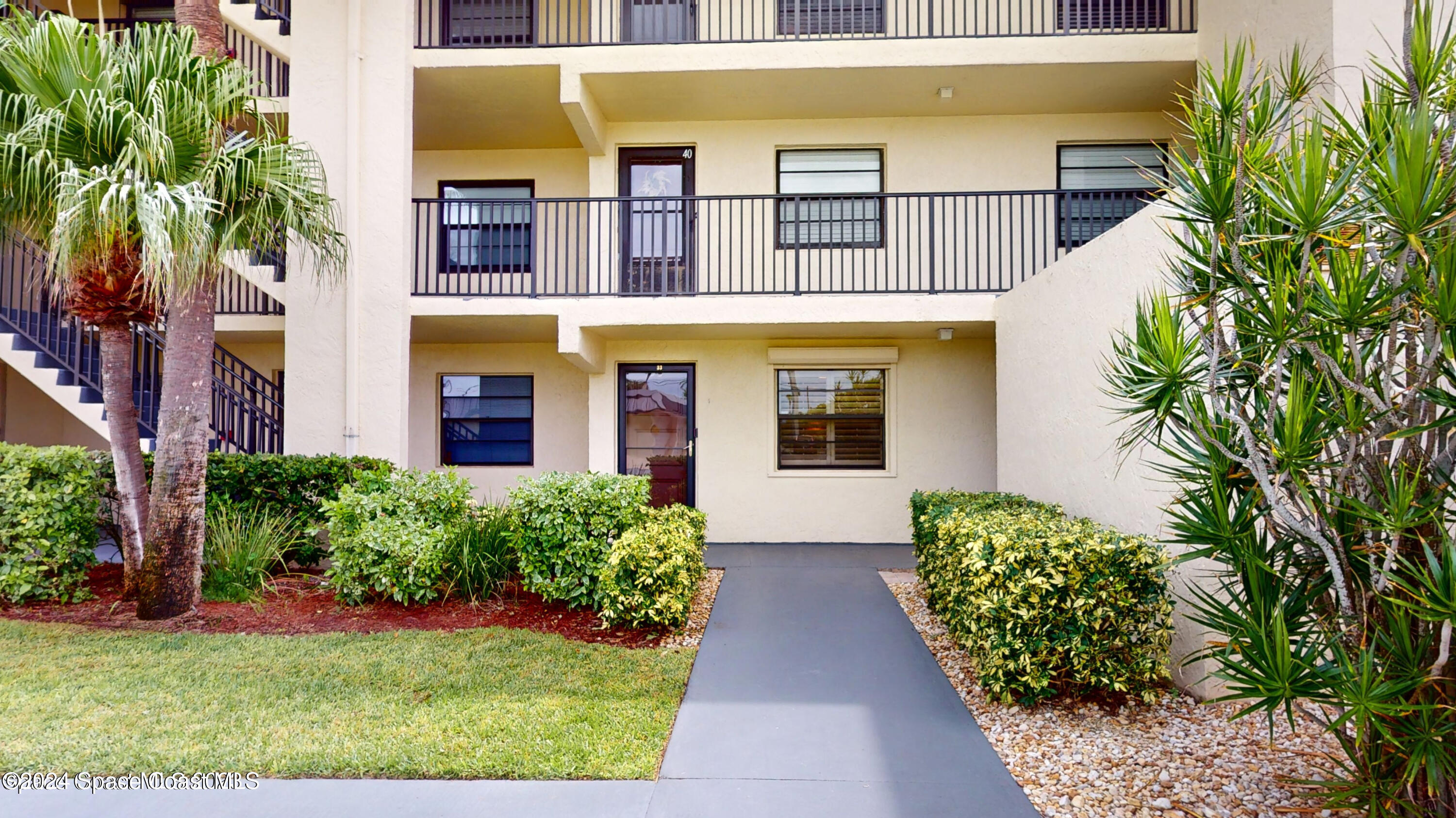 a front view of a multi story residential apartment building