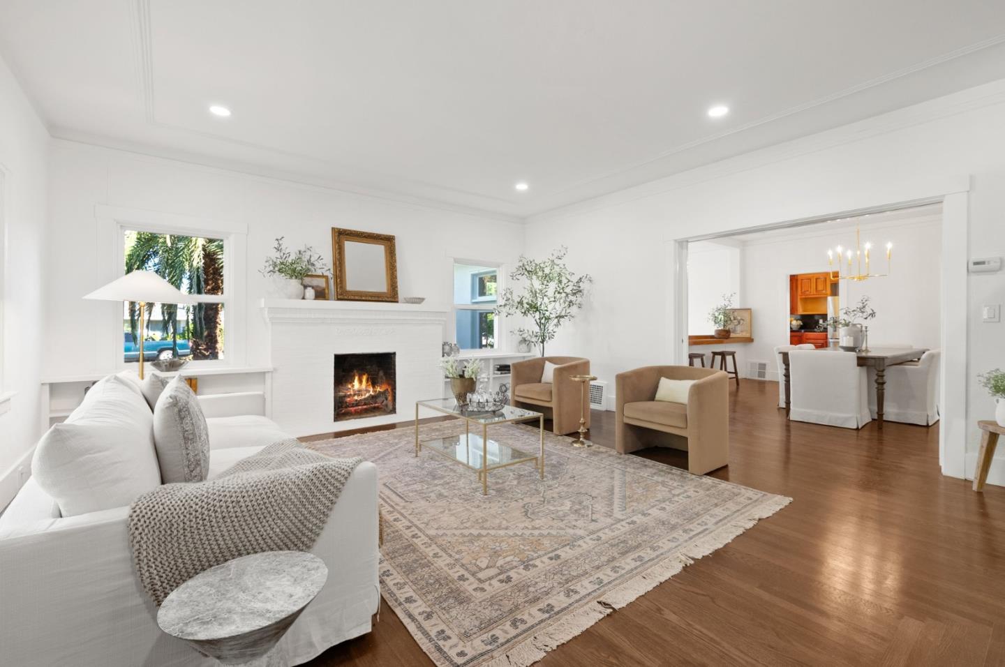 a living room with furniture couches and a fireplace