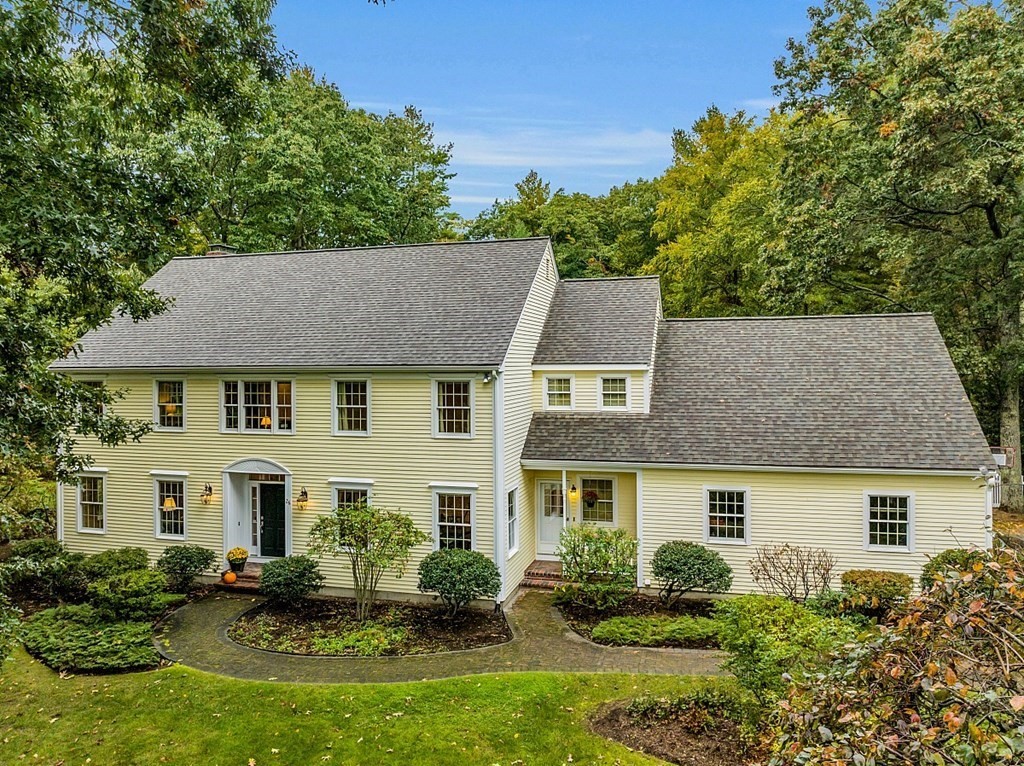 front view of a house with a yard