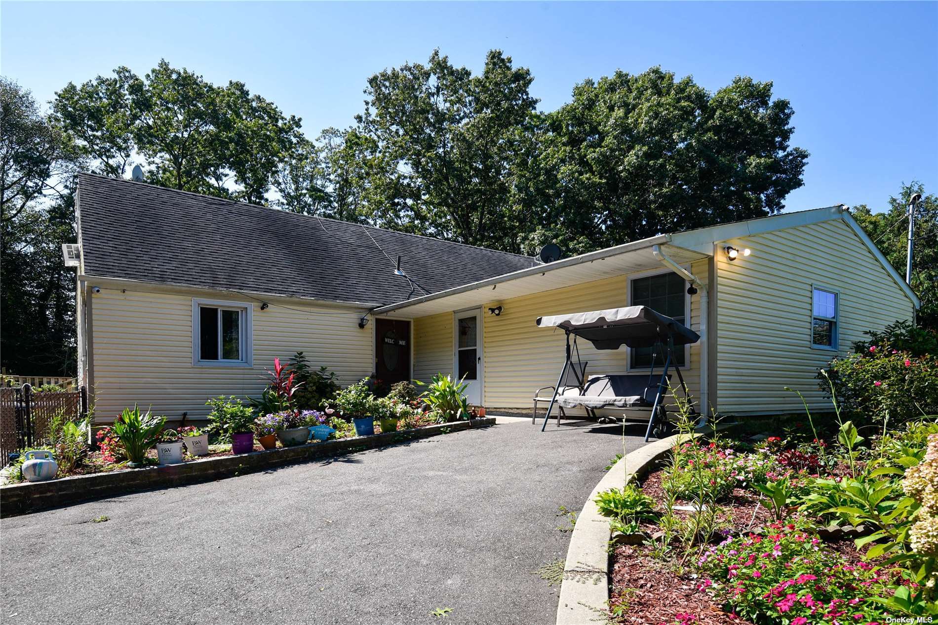 a front view of a house having patio