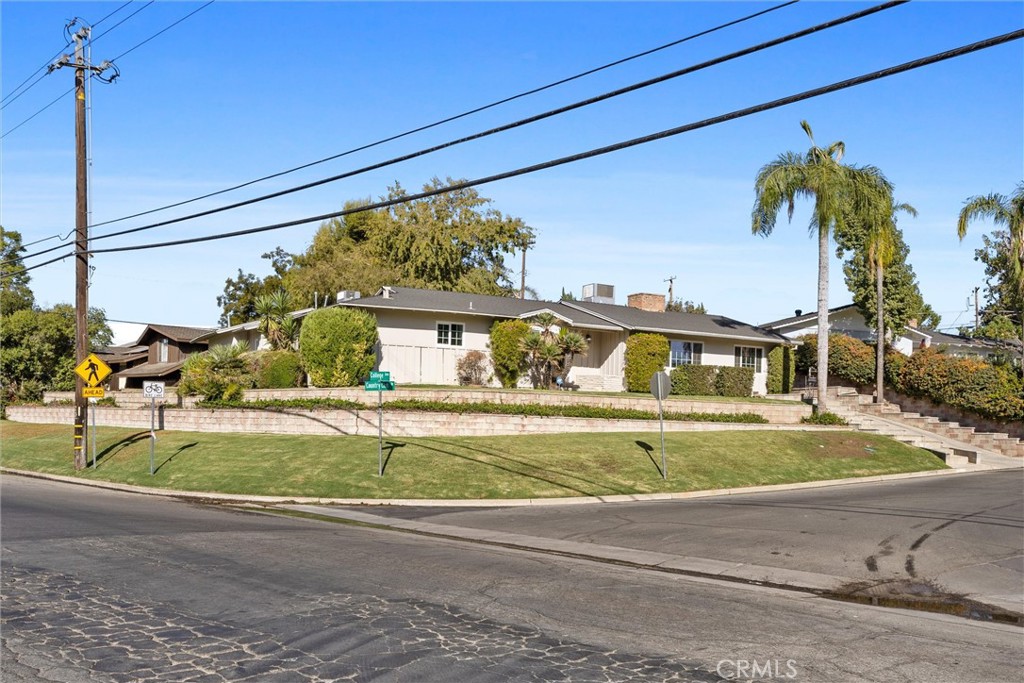 a view of a house in a yard