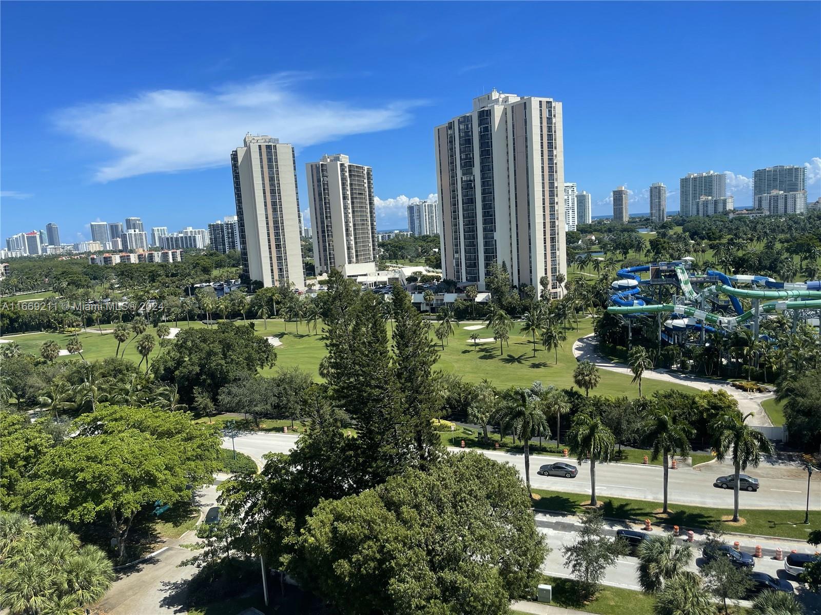 a view of a city with tall buildings