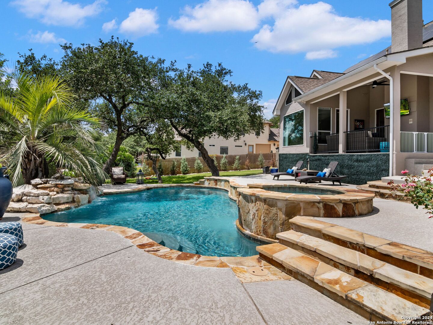 a view of a house with outdoor space and sitting area