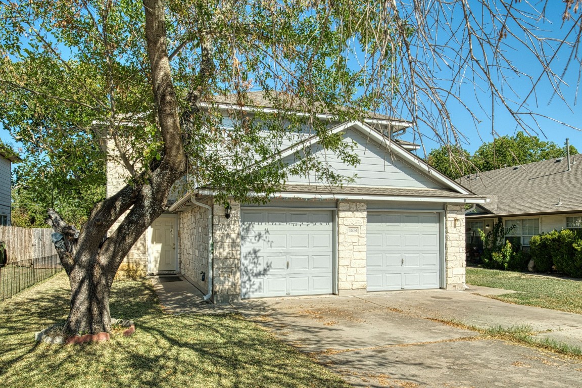 a house with a tree in front of it