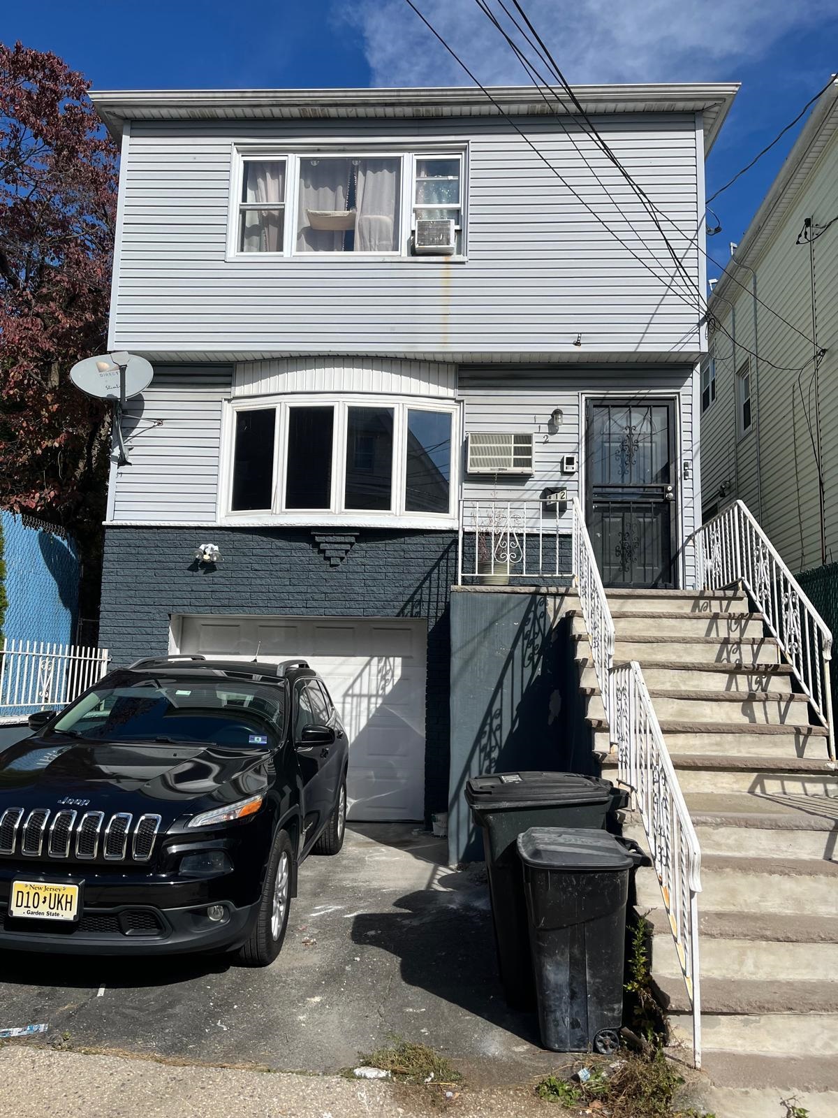 a front view of a house with balcony