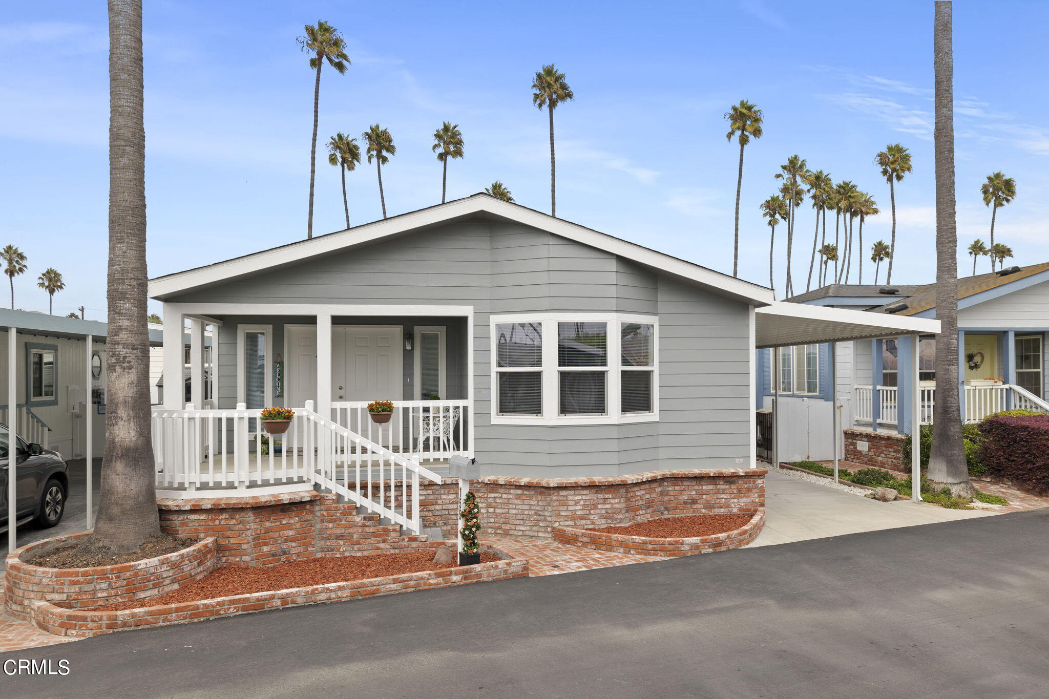 a front view of a house with a porch