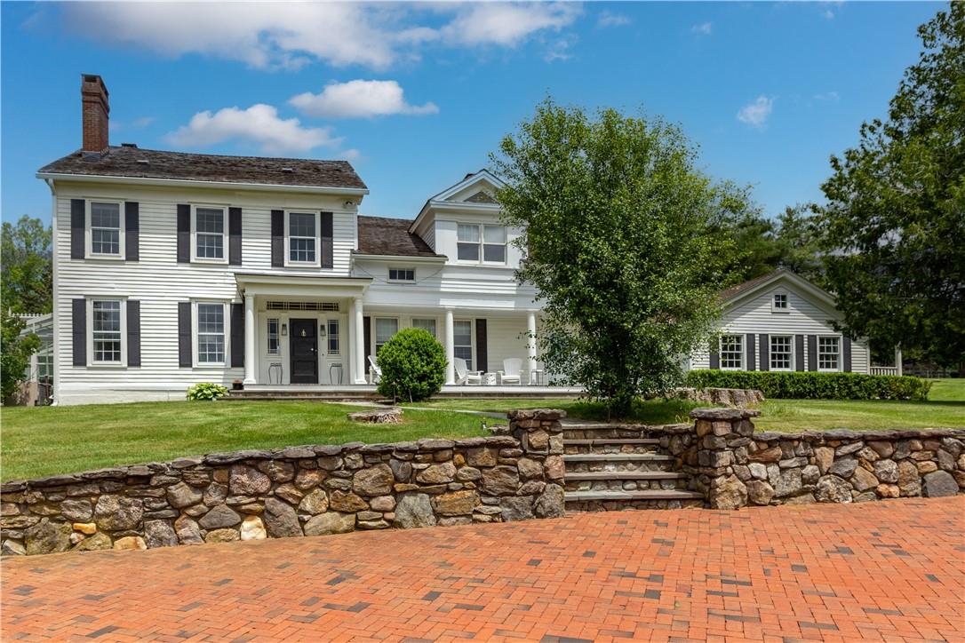 Now for rent is one of Quaker Hill's most prestigious estate homes.