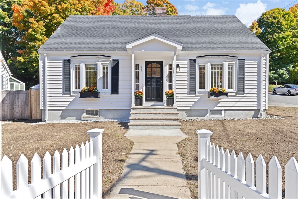 a front view of a house with a porch