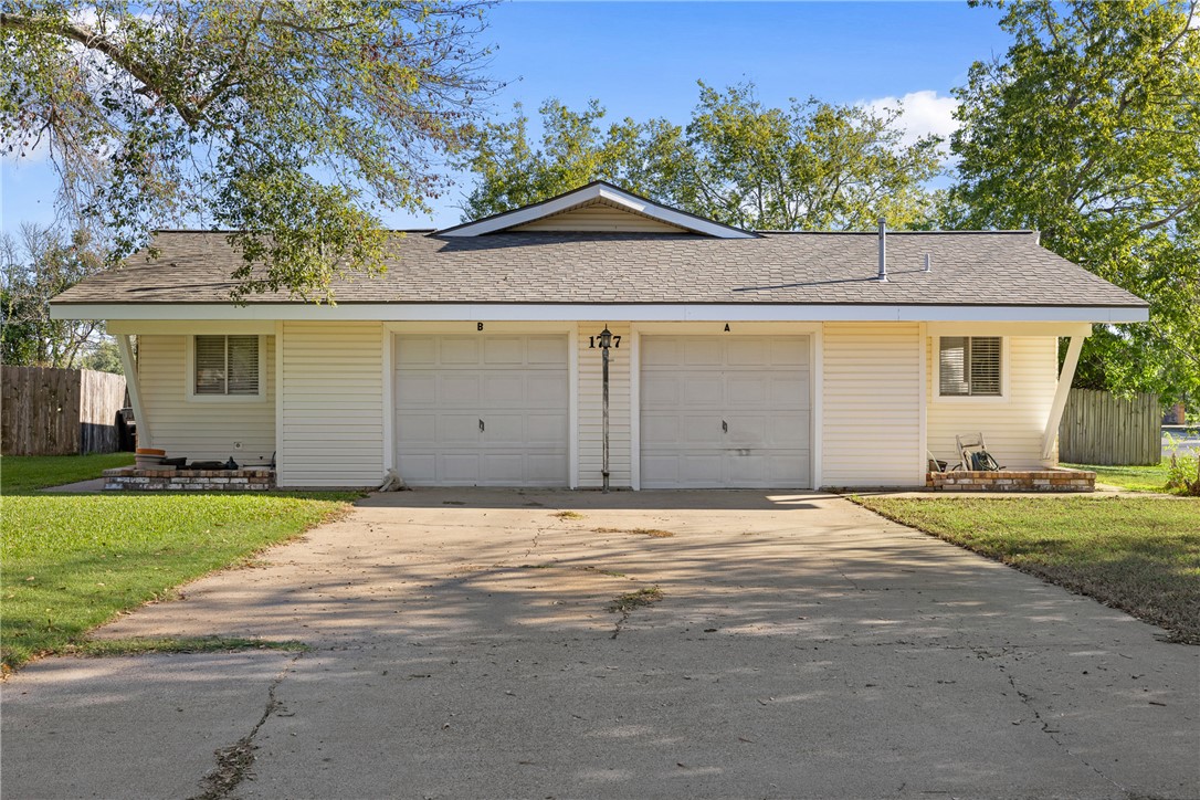 Garage with a lawn