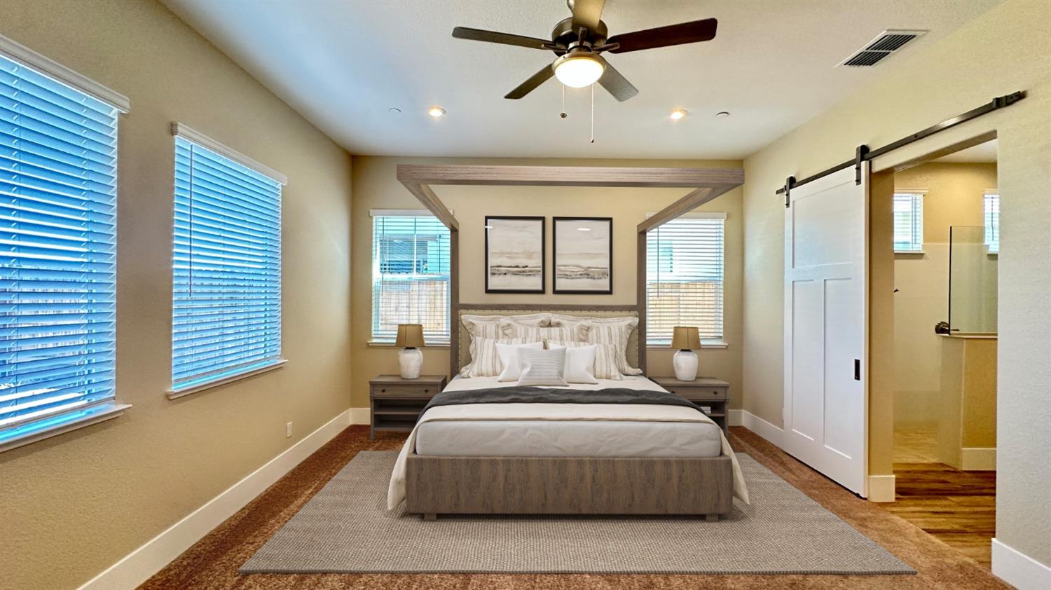 a bedroom with a large bed and a chandelier