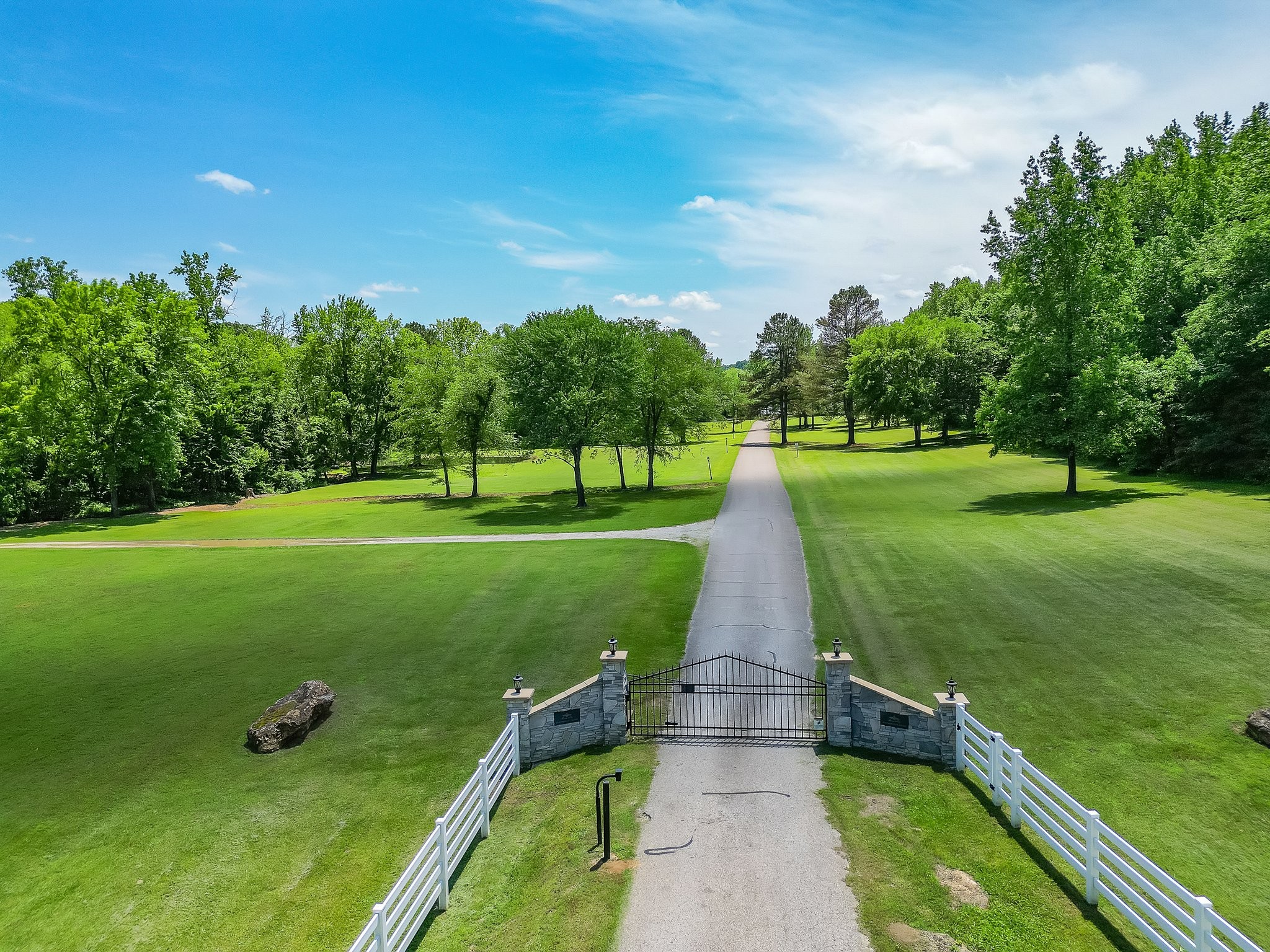 a view of a golf course with a garden