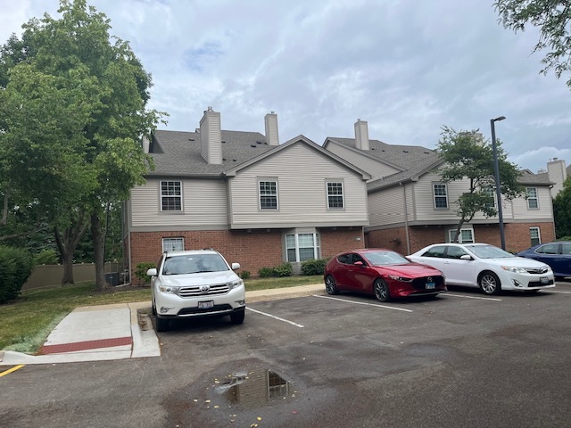 a car parked in front of a house