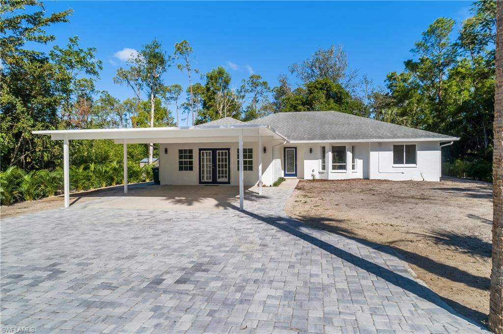 Single story home featuring french doors